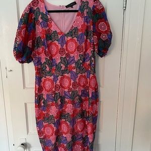 Beautiful floral dress perfect for upcoming spring weddings. Never worn, tags on